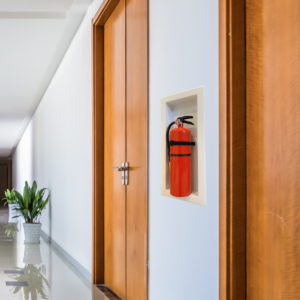 Easy Comply Cabinet with Extinguisher in a Corridor